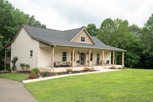 view of front of home featuring a porch and a front yard