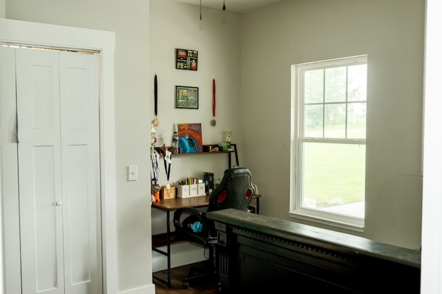 office area with dark hardwood / wood-style flooring