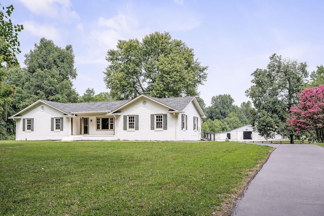 view of front of home with a front lawn