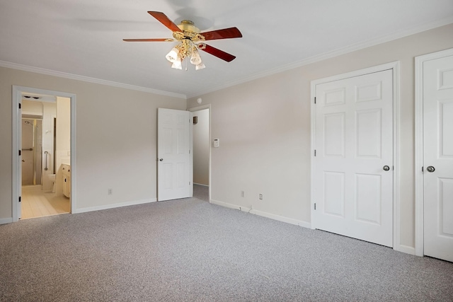 unfurnished bedroom featuring crown molding, ceiling fan, and light colored carpet