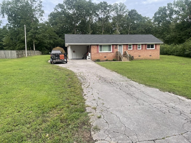 ranch-style home with a front lawn and a carport