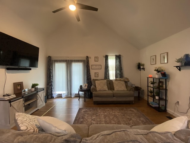 living room featuring high vaulted ceiling, dark hardwood / wood-style floors, and ceiling fan