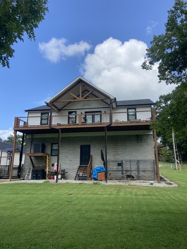 back of house featuring a yard