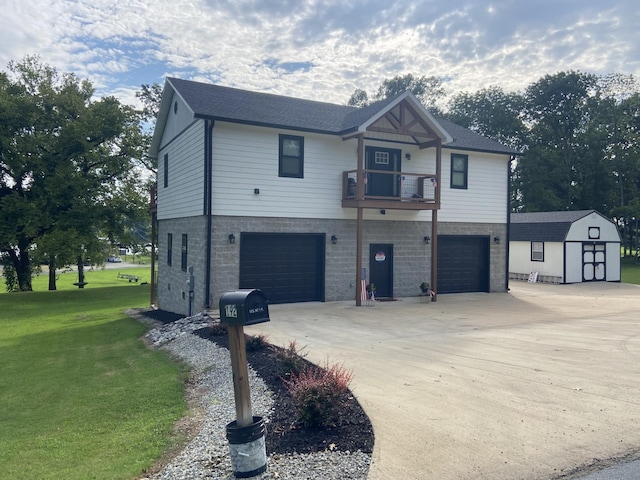 view of property exterior featuring a storage shed, a garage, a lawn, and a balcony