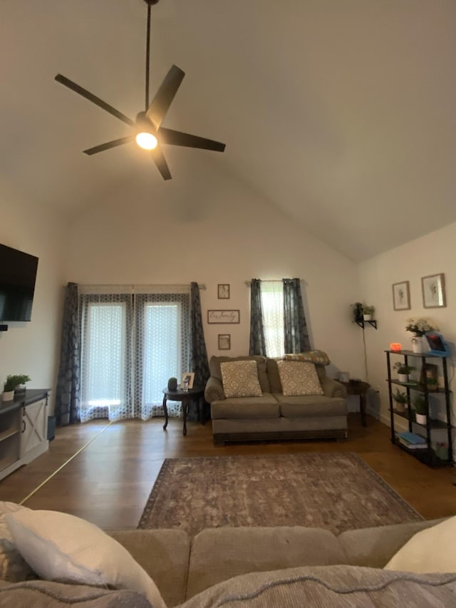 living room with ceiling fan, high vaulted ceiling, and hardwood / wood-style floors