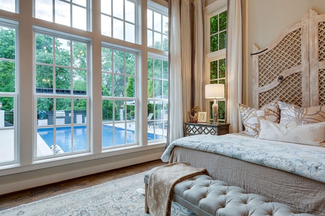 bedroom with wood-type flooring