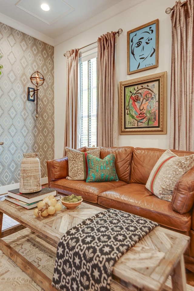 living room featuring crown molding