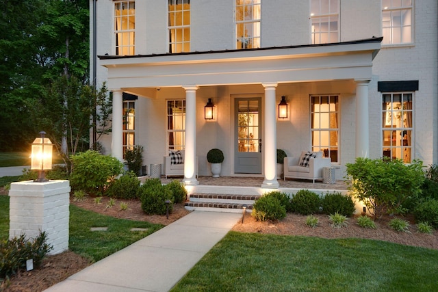 entrance to property with a porch