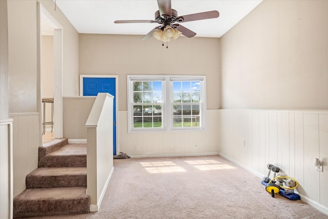 interior space featuring ceiling fan