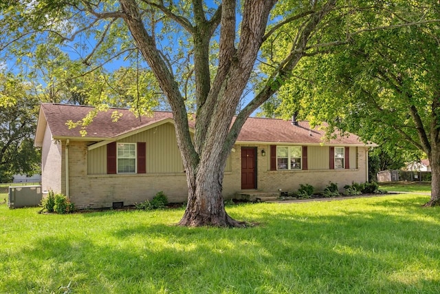 ranch-style house with a front lawn