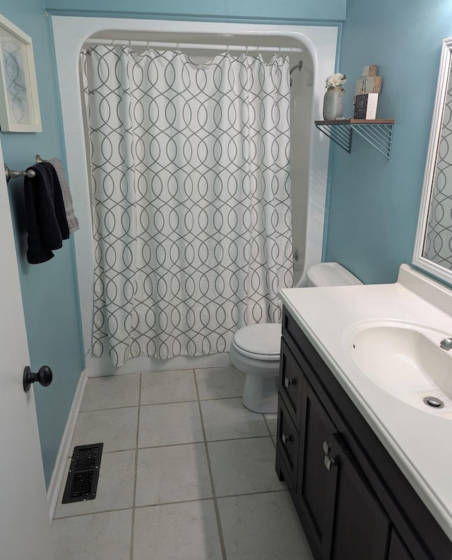 3005 Westwood Dr, Columbia, TN 38401 - full bathroom featuring tile patterned floors, visible vents, toilet, shower / bath combination with curtain, and vanity