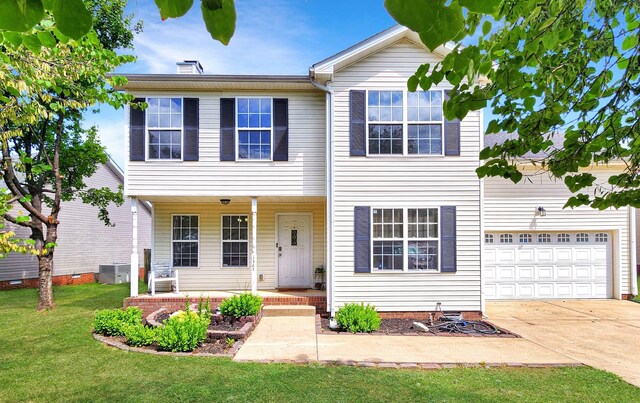 view of front of home featuring a front yard and central air condition unit