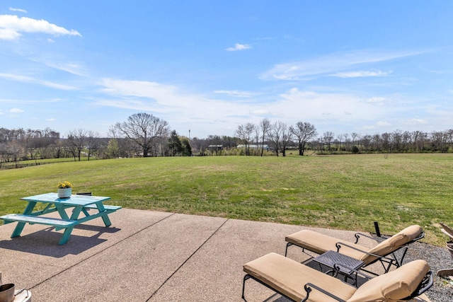 view of patio / terrace featuring a rural view