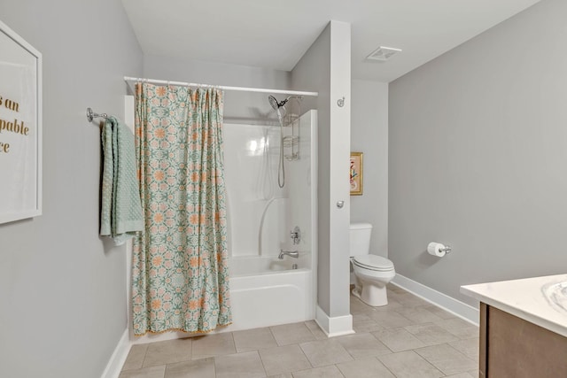 full bathroom featuring vanity, toilet, tile patterned flooring, and shower / bath combo with shower curtain