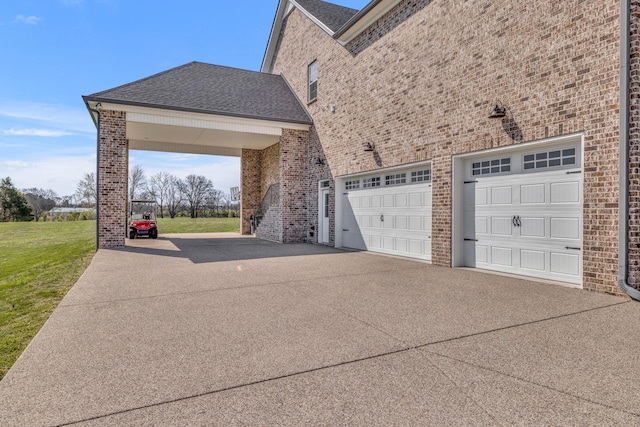 garage with a yard