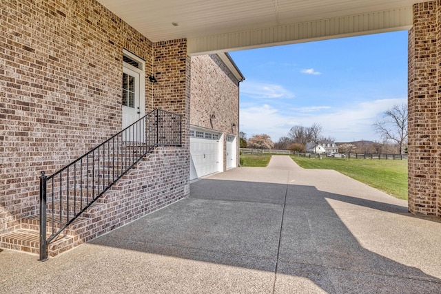 view of patio / terrace with a garage