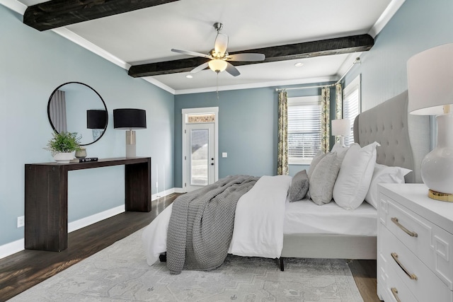 bedroom with access to outside, ornamental molding, dark hardwood / wood-style flooring, beamed ceiling, and ceiling fan