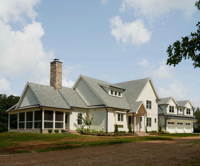 view of front of property with a garage