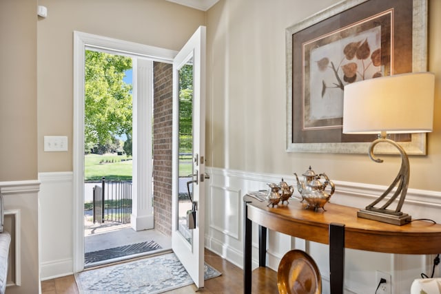 doorway to outside with light wood-type flooring