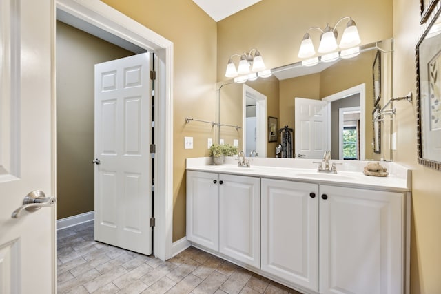 bathroom with wood-type flooring and vanity