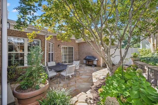 view of patio featuring a grill