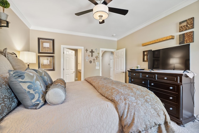 bedroom with ceiling fan, ensuite bath, and crown molding