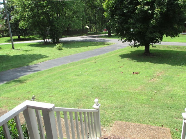 view of community featuring a lawn