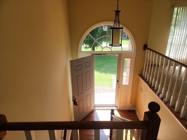 entryway with plenty of natural light and a high ceiling