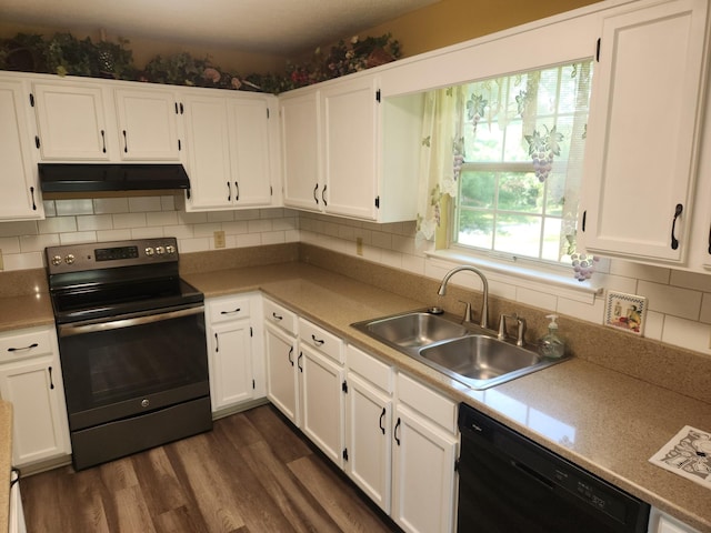 kitchen with black dishwasher, electric stove, under cabinet range hood, white cabinetry, and a sink