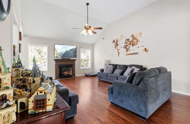 living room featuring lofted ceiling, dark hardwood / wood-style floors, and ceiling fan