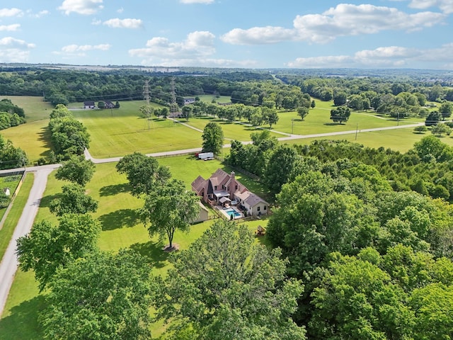 birds eye view of property featuring a rural view