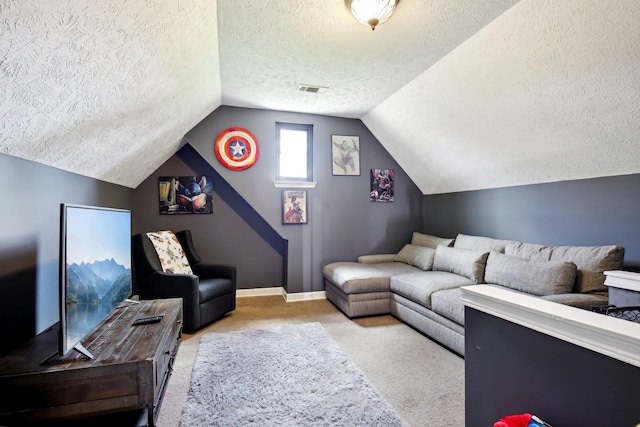 carpeted living room with lofted ceiling and a textured ceiling