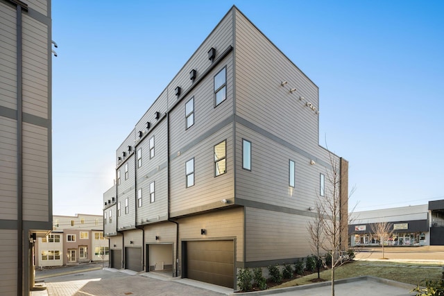 view of building exterior featuring a garage