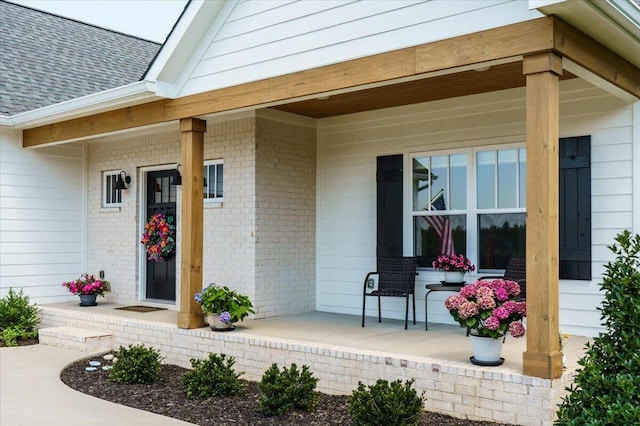 property entrance with covered porch