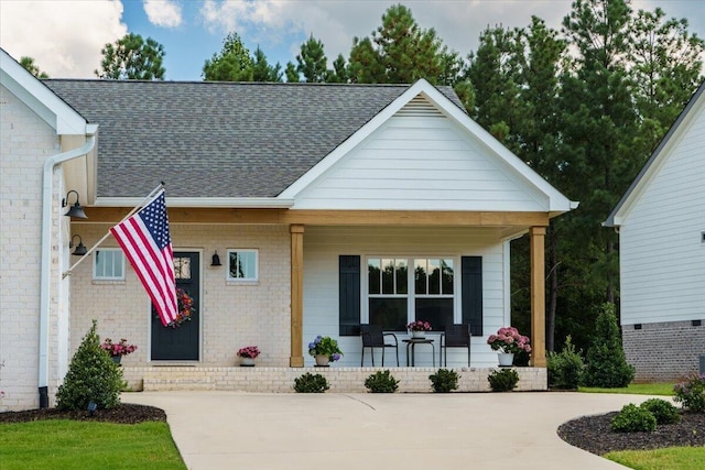 view of front of home featuring covered porch