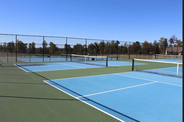 view of tennis court with basketball court