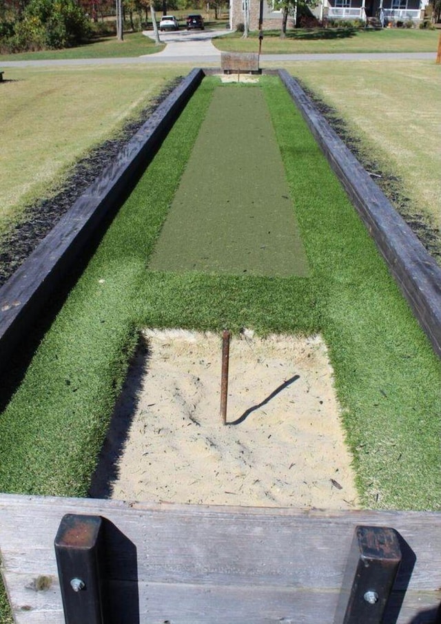 surrounding community with a lawn