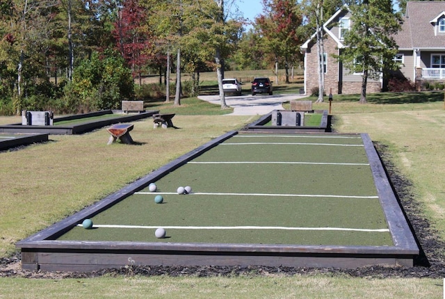 view of community with a yard
