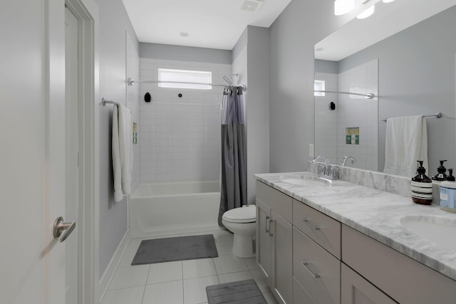 full bathroom featuring shower / tub combo with curtain, tile patterned floors, toilet, and vanity