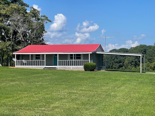 single story home featuring a front yard and covered porch