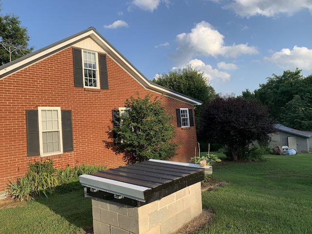 view of property exterior featuring a yard