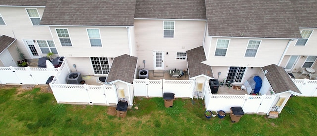 rear view of house with central AC