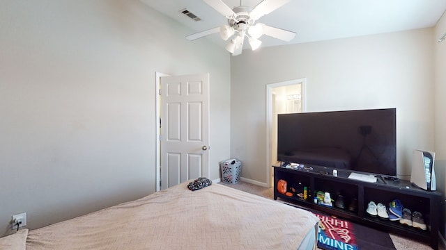 bedroom featuring carpet, lofted ceiling, and ceiling fan