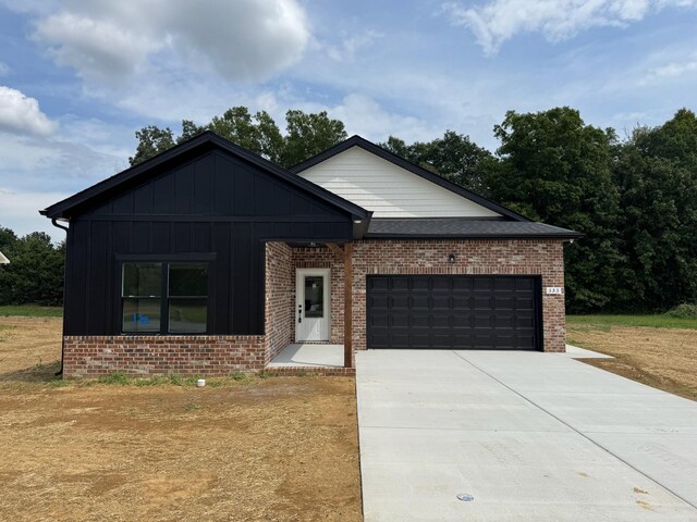 view of front of home with a garage