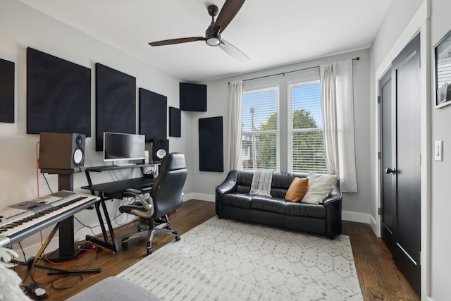 office featuring dark wood-type flooring and ceiling fan