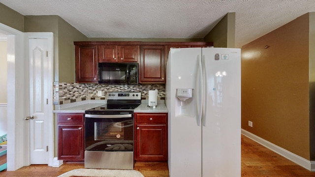 kitchen featuring a textured ceiling, electric range, white fridge with ice dispenser, hardwood / wood-style floors, and backsplash