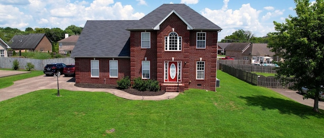 view of front facade featuring a front yard