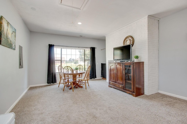 dining space featuring electric panel and carpet flooring