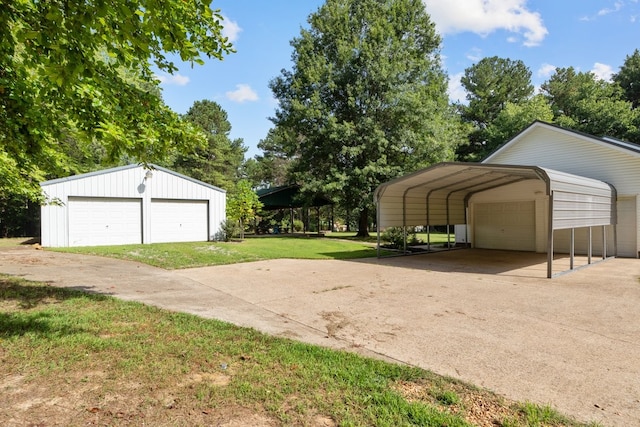 garage with a yard and a carport