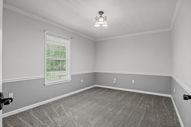 carpeted spare room with ornamental molding